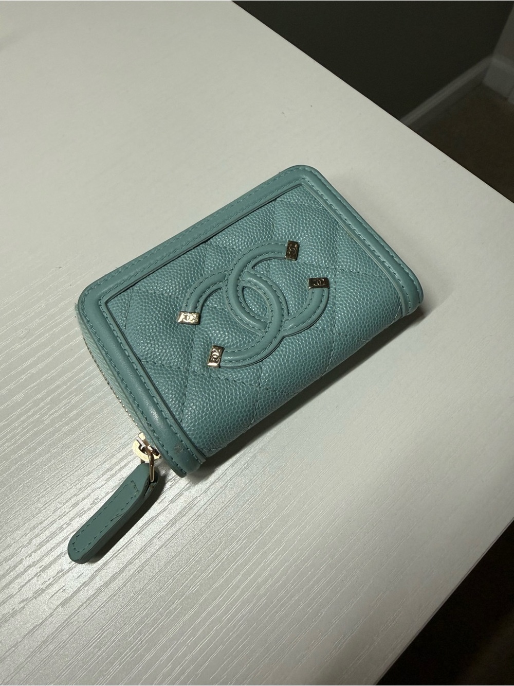 CHANEL Small Quilted Zip Wallet in Aqua Blue(used)